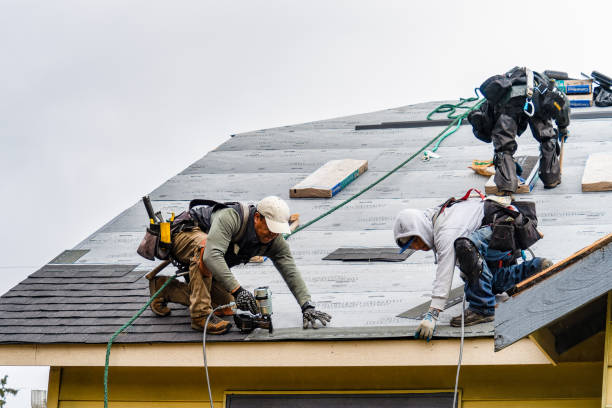 Professional Gutter Installation technician working in Ramona, CA